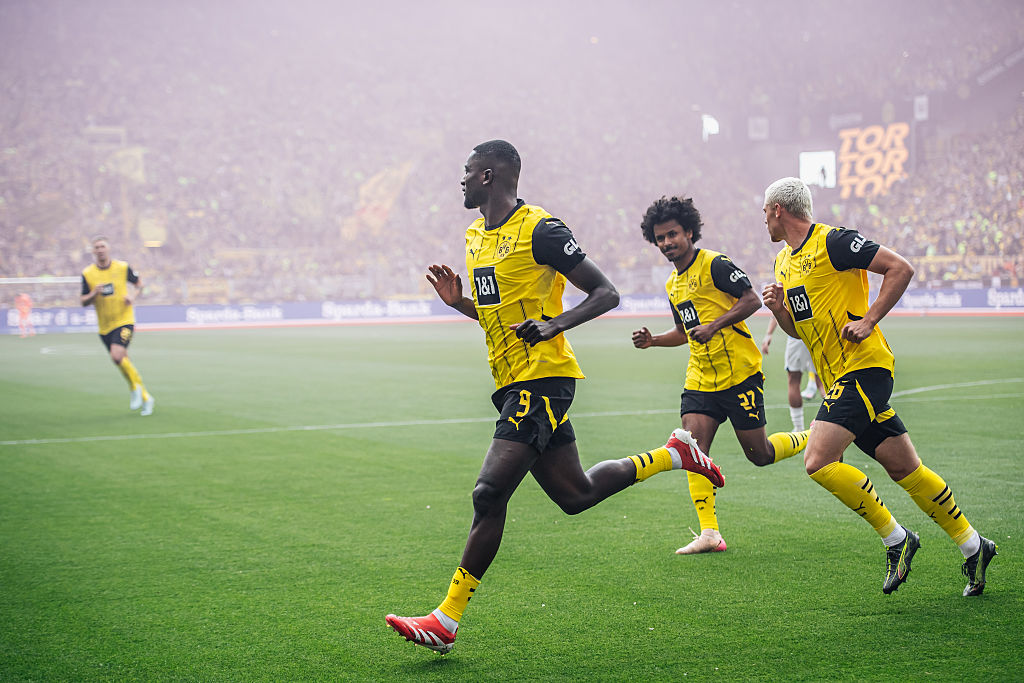 Serhou Guirassy of Borussia Dortmund celebrates his team's first goal during the Bundesliga match between Borussia Dortmund and Holstein Kiel at Signal Iduna Park in Dortmund, Germany, on May 17, 2025.