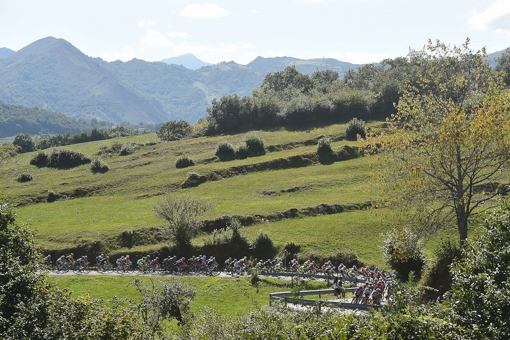 The peloton rides through the Spanish countryside during stage 15.