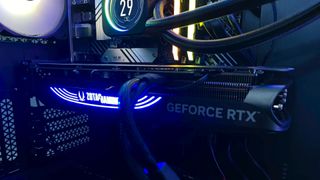 Zotac RTX 4070 Super within PC case next to AIO cooler and RGB RAM
