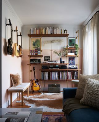 A living room with wall storage
