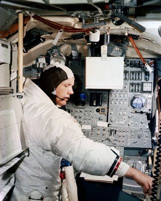 Neil Armstrong trains in the Lunar Module simulator at Kennedy Space Center on June 19, 1969.