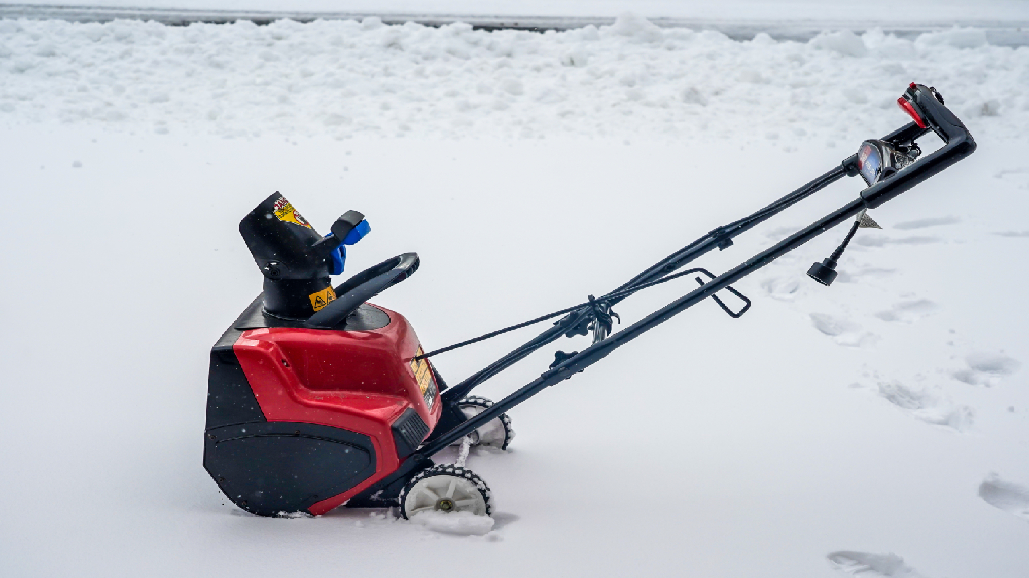 Snow blower with primer bulb visible