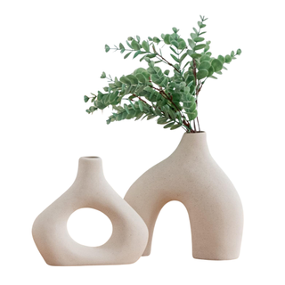 A set of white ceramic vases