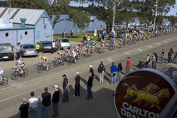 The field string out during the final stage criterium in Paynesville, a 44 kilometre dash around a water-side circuit.