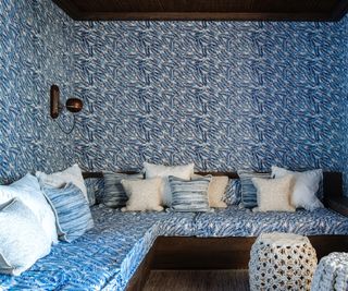 Blue wallpapered indoor outdoor snug