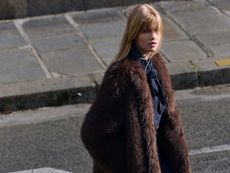 models wear h&M clothing. one model wears. barn jacket white shorts and a button down top, one model wears pink satin skirt and black leather bomber. one model wers faux fur coat and denim jeand and top.