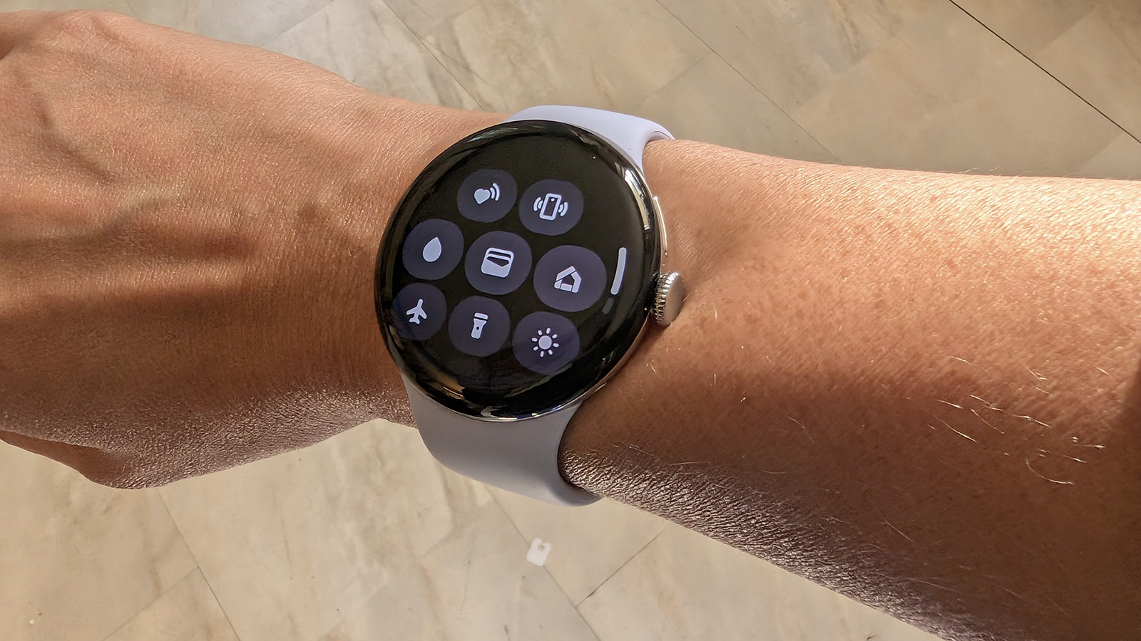 Google Pixel Watch 4 with Find My Phone on screen