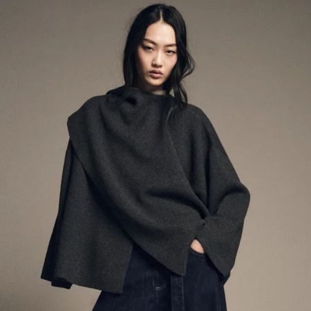 Woman wears scarf cape from Zara