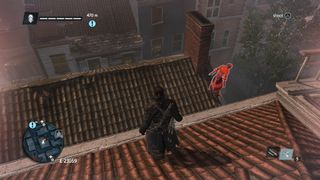 Shay stands on a roof, looking down at an Assassin who was waiting to jump him in Assassin's Creed Rogue Remastered