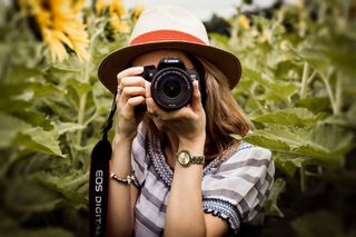 woman taking a picture - smugmug photos