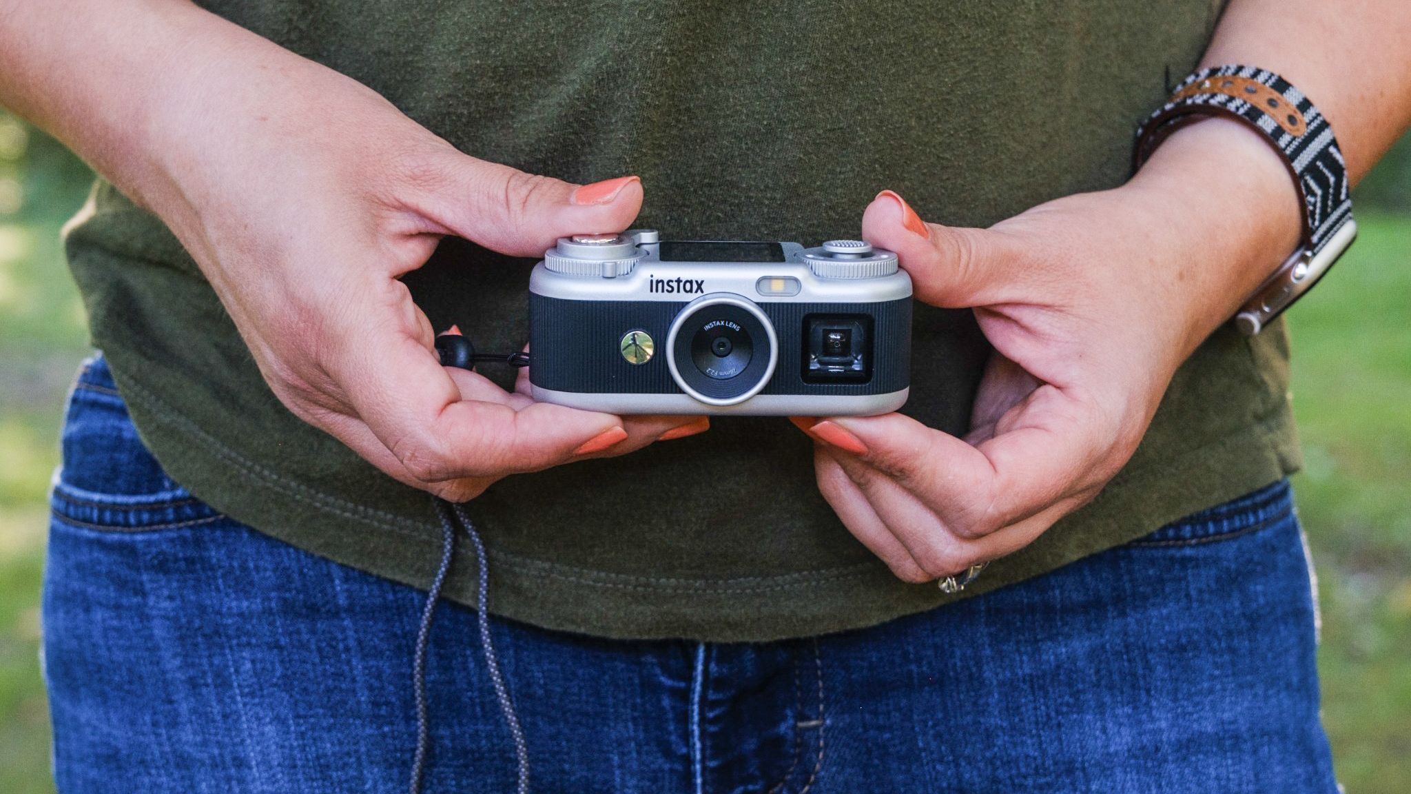 Instax Pal 2 being held by a woman