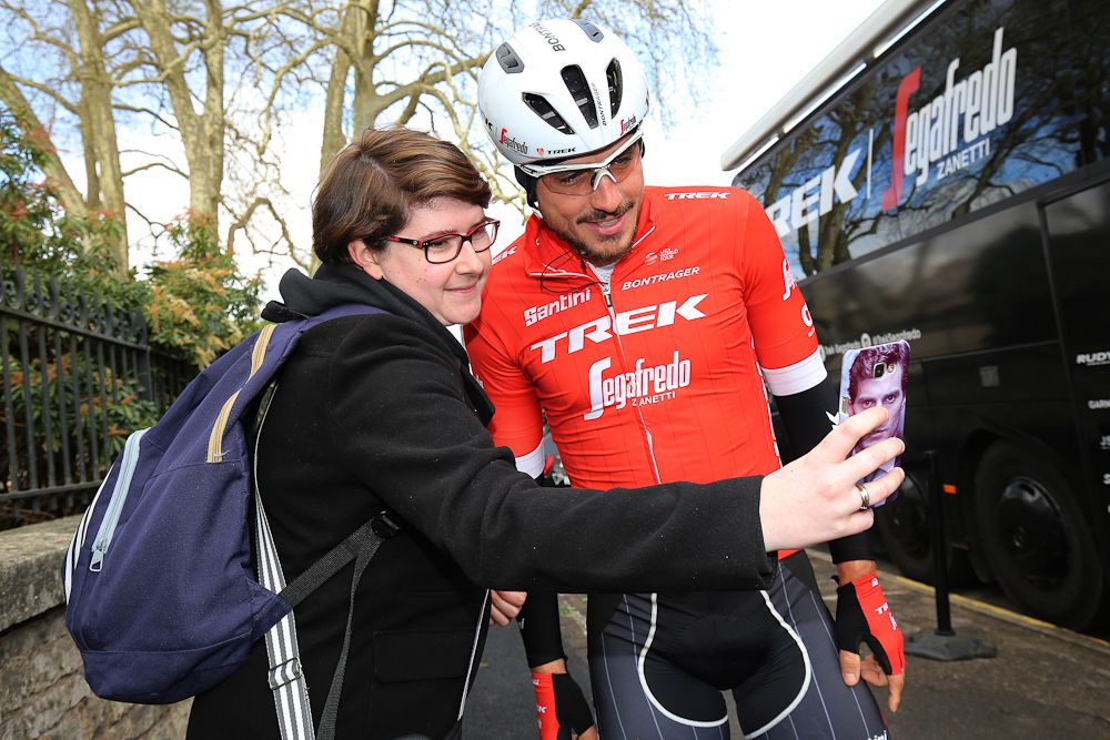 John Degenkolb poses for a photo with a fan before stage 3 at Paris-Nice