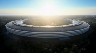 Apple Park shining in the sun with blue sky