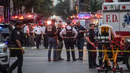 First responders are seen after the shooting at 345 Park Avenue in Manhattan on July 28, 2025.