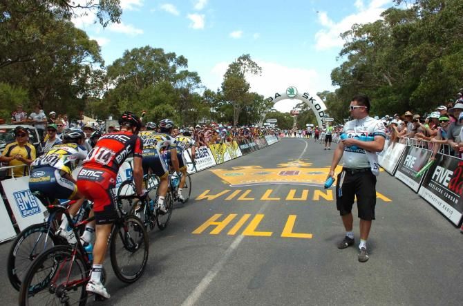 Riders go through the feedzone on Old Willunga