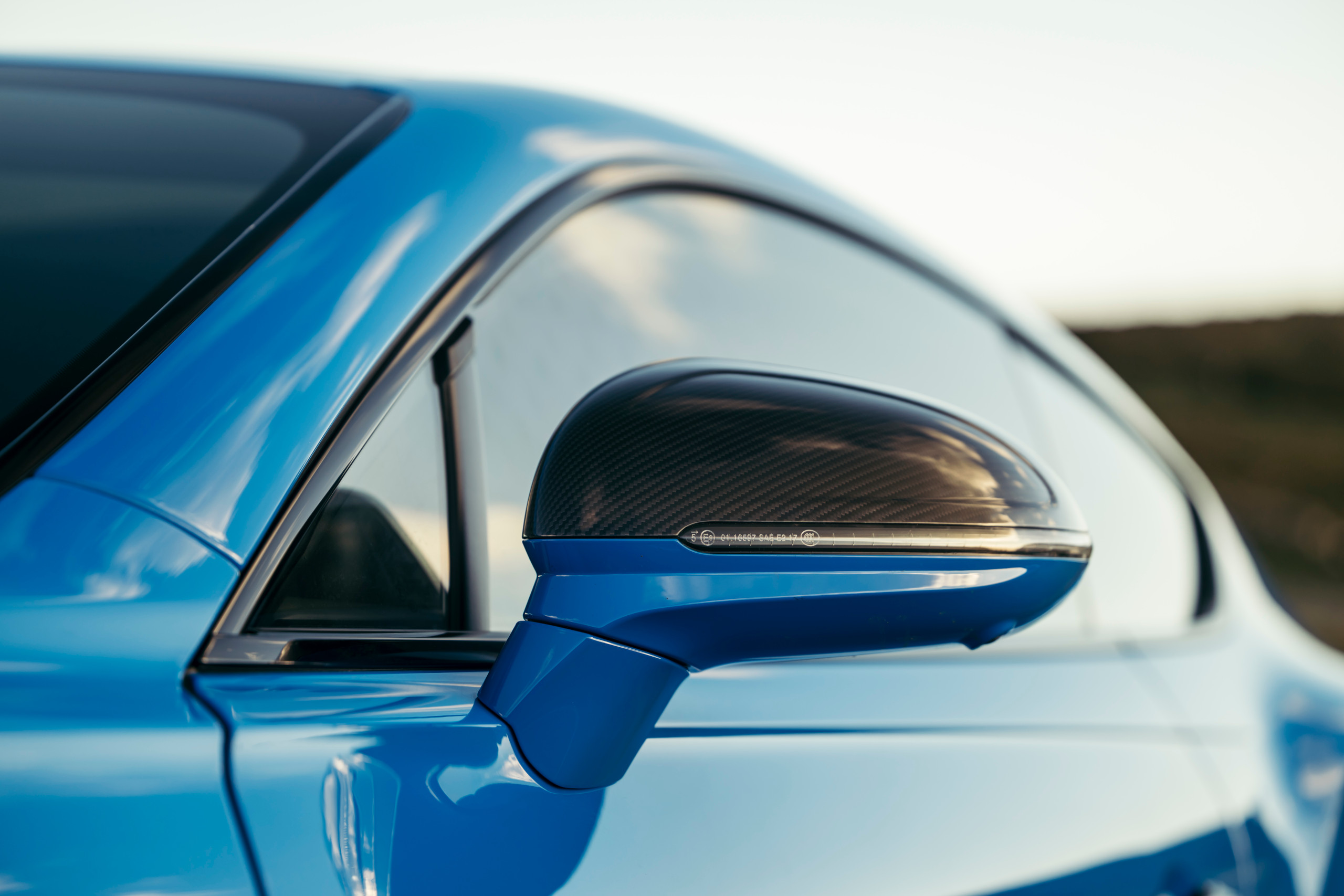 The car features the optional Carbon Fibre Styling Specification