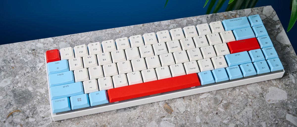 A Cherry MX LP 2.1 low-profile keyboard with red, white and blue keycaps