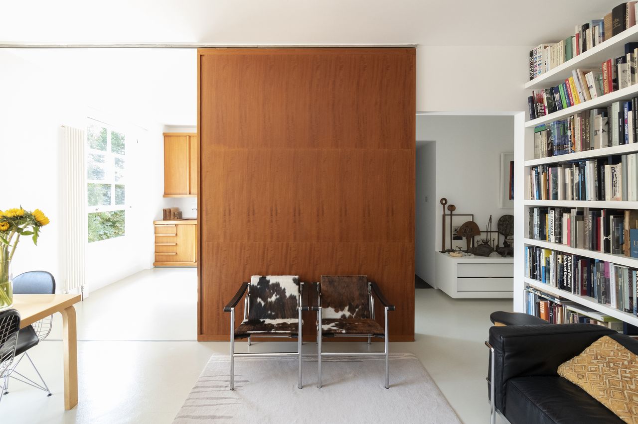 Minimalist London apartment with feature wooden sliding doors