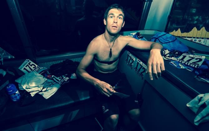 Jack Bauer on the team bus sorts out his race number before the start