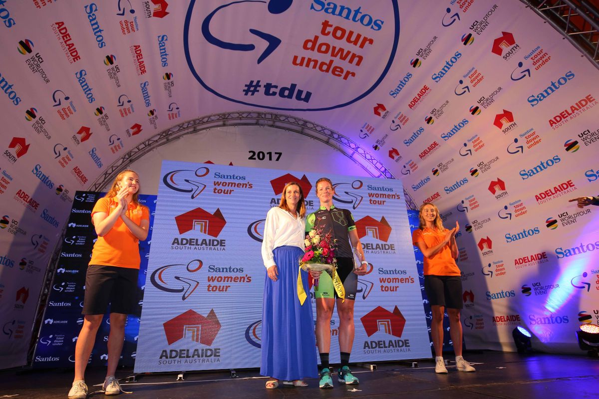 Kirsten Wild steps onto the podium to collect her prize