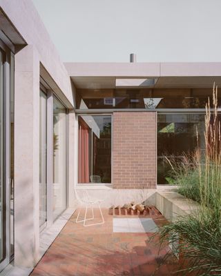 Six Columns House by 31/44 Architects, patio