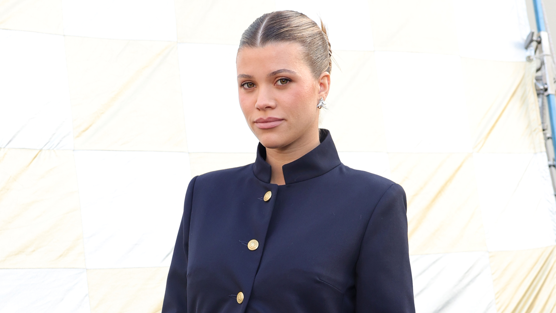 Sofia Richie Grainge debuted her growing baby bump under the military jacket trend