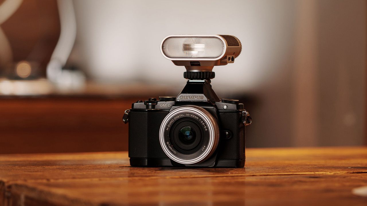 The Viltrox Vintage Z1 flash mounted on a camera