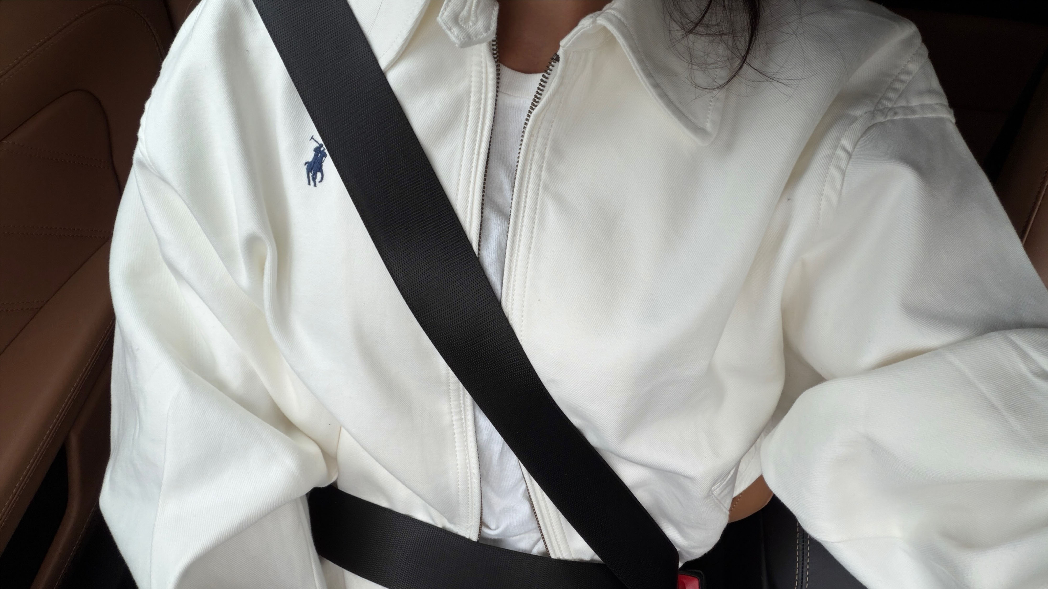 Woman wearing a Polo Ralph Lauren jacket.