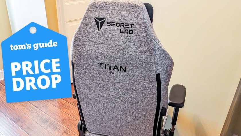 A Secretlab Titan Evo chair in a hallway with a Tom&#039;s Guide Price Drop deals badge on top