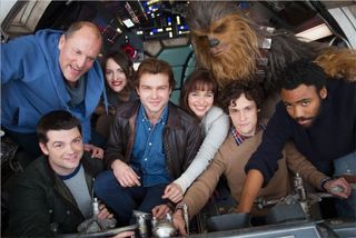 The cast of the Han Solo Star Wars Story on board the Millennium Falcon