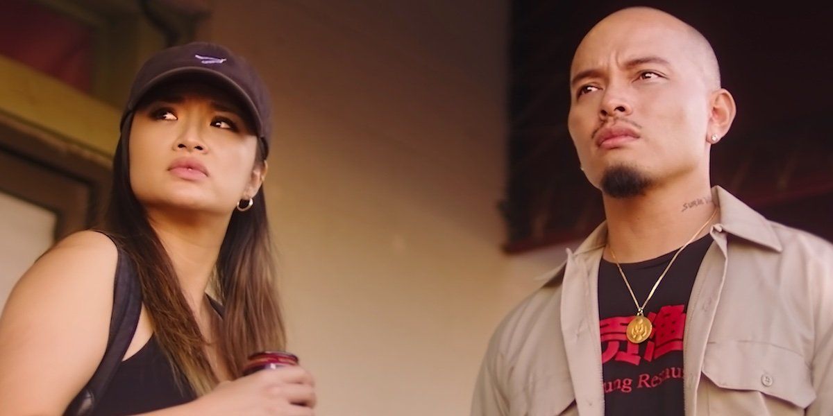 Tera (Hedy Wong) and Saren (Lorin Alond Ly) stand outside their family&#039;s restaurant in Take Out Girl