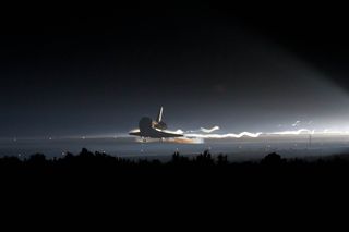 Final space shuttle mission ends with night landing