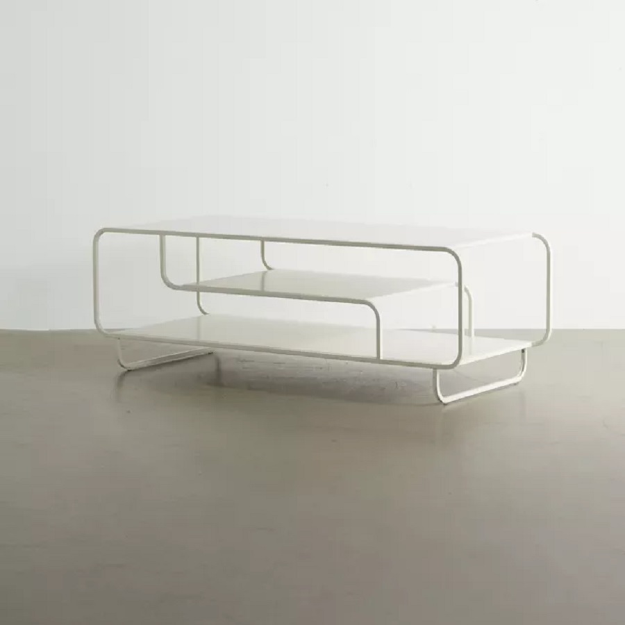 A three-tier white coffee table