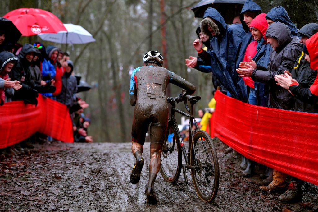 NAMUR BELGIUM DECEMBER 22 Rider Public Fans Mud Bike during the 11th Namur World Cup 2019 UCICX TelenetUCICXWC on December 22 2019 in Namur Belgium Photo by Luc ClaessenGetty Images