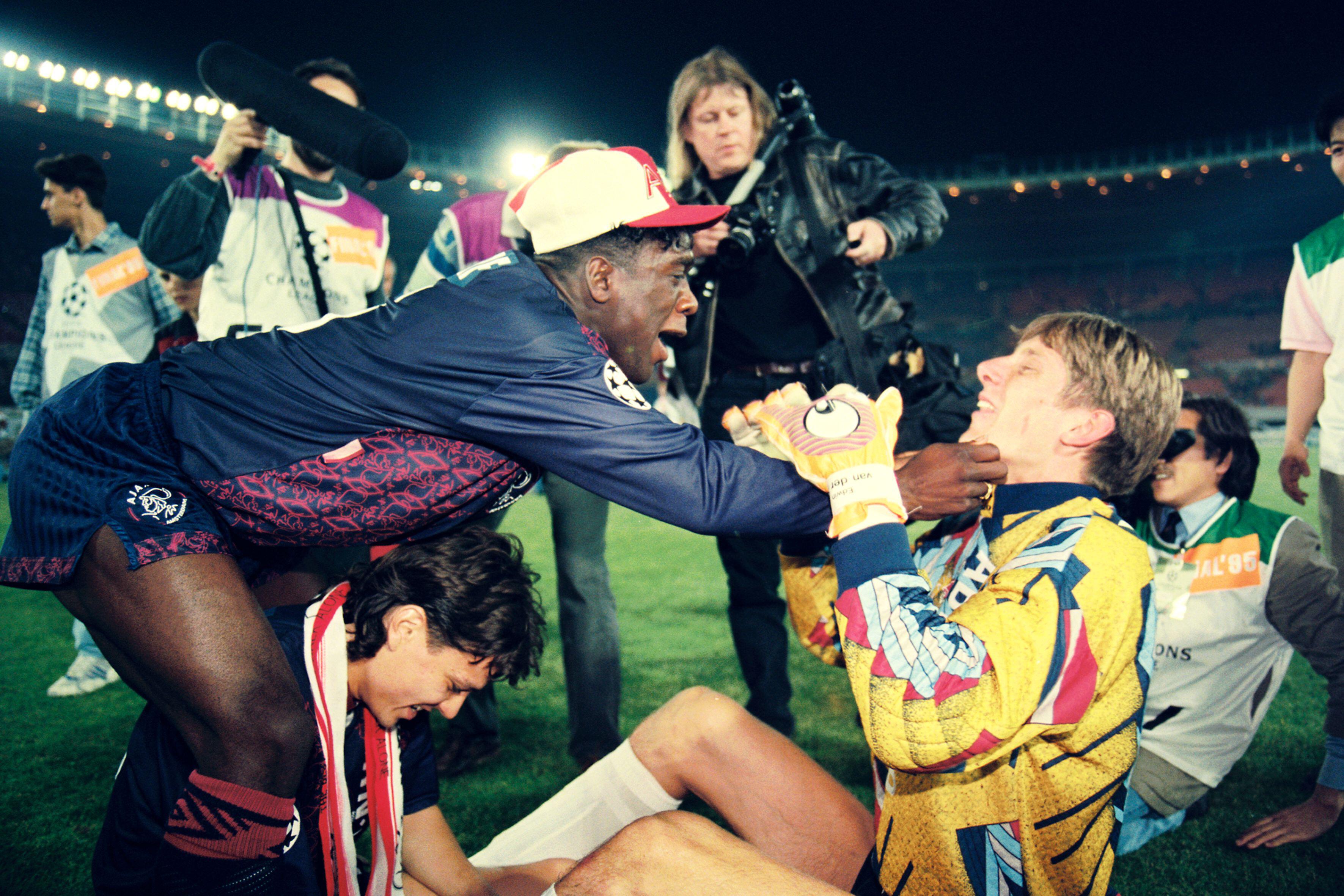 Clarence Seedorf, Jari Litmanen and Edwin van der Sar celebrate Ajax's 1995 Champions League final victory over Milan
