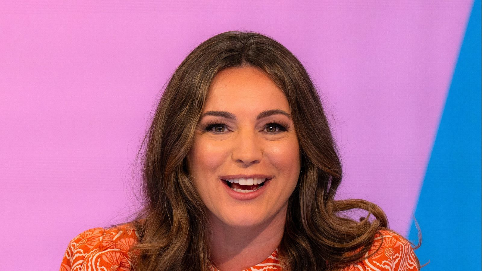 Sunshine is on its way, and Kelly Brook's zesty dress is the perfect choice for warmer weather