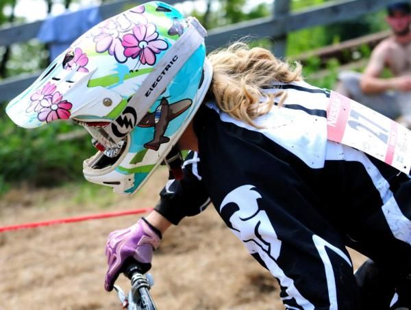 Gabrielle Malloy has had her helmet painted with flowers.
