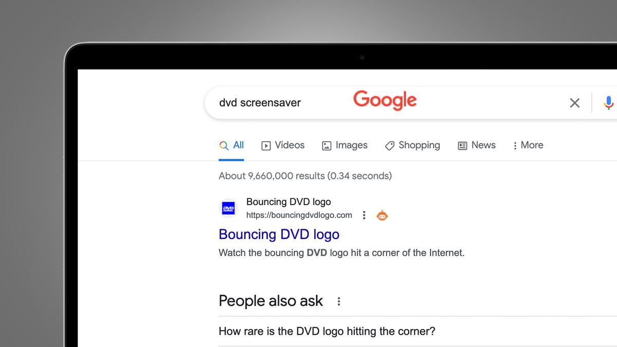 A laptop screen on a grey background showing a Google easter egg for DVD screensaver