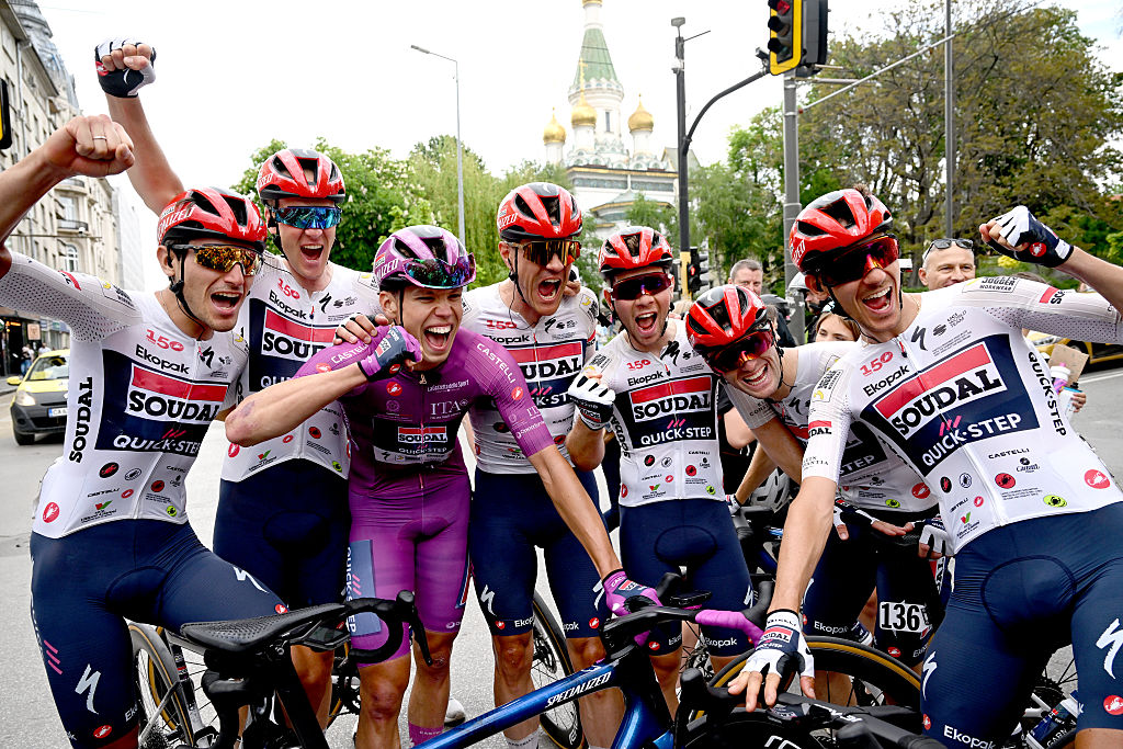 SOFIA, BULGARIA - MAY 10: Stage winner Paul Magnier of France and Team Soudal Quick-Step - Purple Points Jersey celebrates the victory of with his teammates Ayco Bastiaens of Belgium, Gianmarco Garofoli of Italy, Andrea Raccagni Noviero of Italy, Jasper Stuyven of Belgium, Fabio Van den Bossche of Belgium, Dries Van Gestel of Belgium, Filippo Zana of Italy after the 109th Giro d&amp;amp;apos;Italia 2026, Stage 3 a 175km stage from Plovdiv to Sofia / #UCIWT / on May 10, 2026 in Sofia, Bulgaria. (Photo by Dario Belingheri/Getty Images)