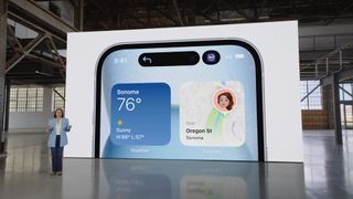 The iPhone 15 being introduced at Apple's special event in September 2023, with the phone's Dynamic Island on display.