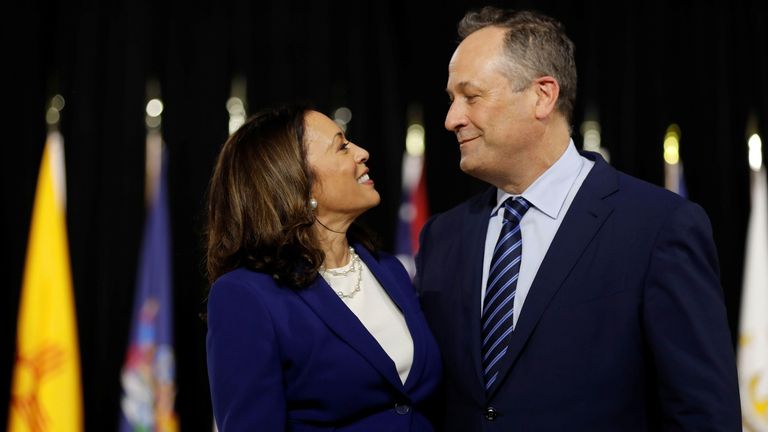 Democratic vice presidential candidate Senator Kamala Harris and her husband Douglas Emhoff are seen at the stage during a campaign event at Alexis Dupont High School in Wilmington, Delaware, U.S