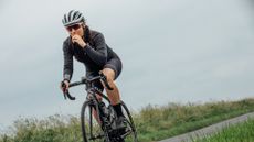 Image shows a rider fuelling on a long bike ride.