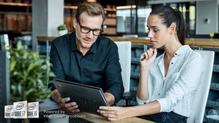 Man and woman using Lenovo ThinkPad laptop