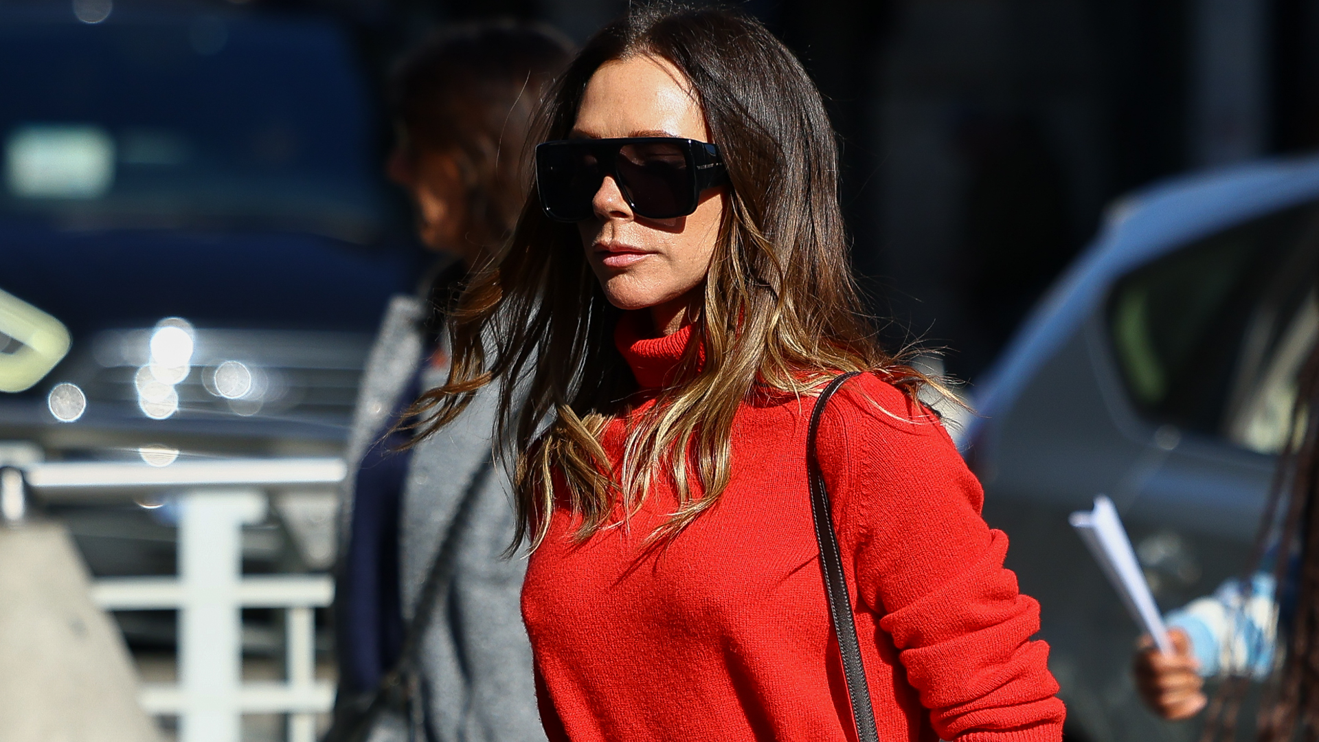 Victoria Beckham arrives at Paris Fashion Week wearing a rare, shearling Herm&egrave;s Kelly bag