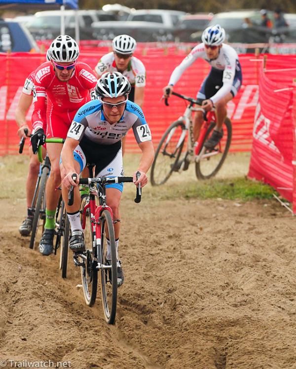 Mark Batty (Spidertech-C10) leading a group through one of the three sand pits