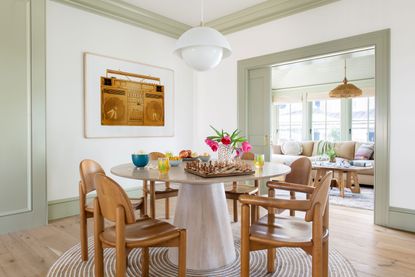 a dining room with chunky door trim