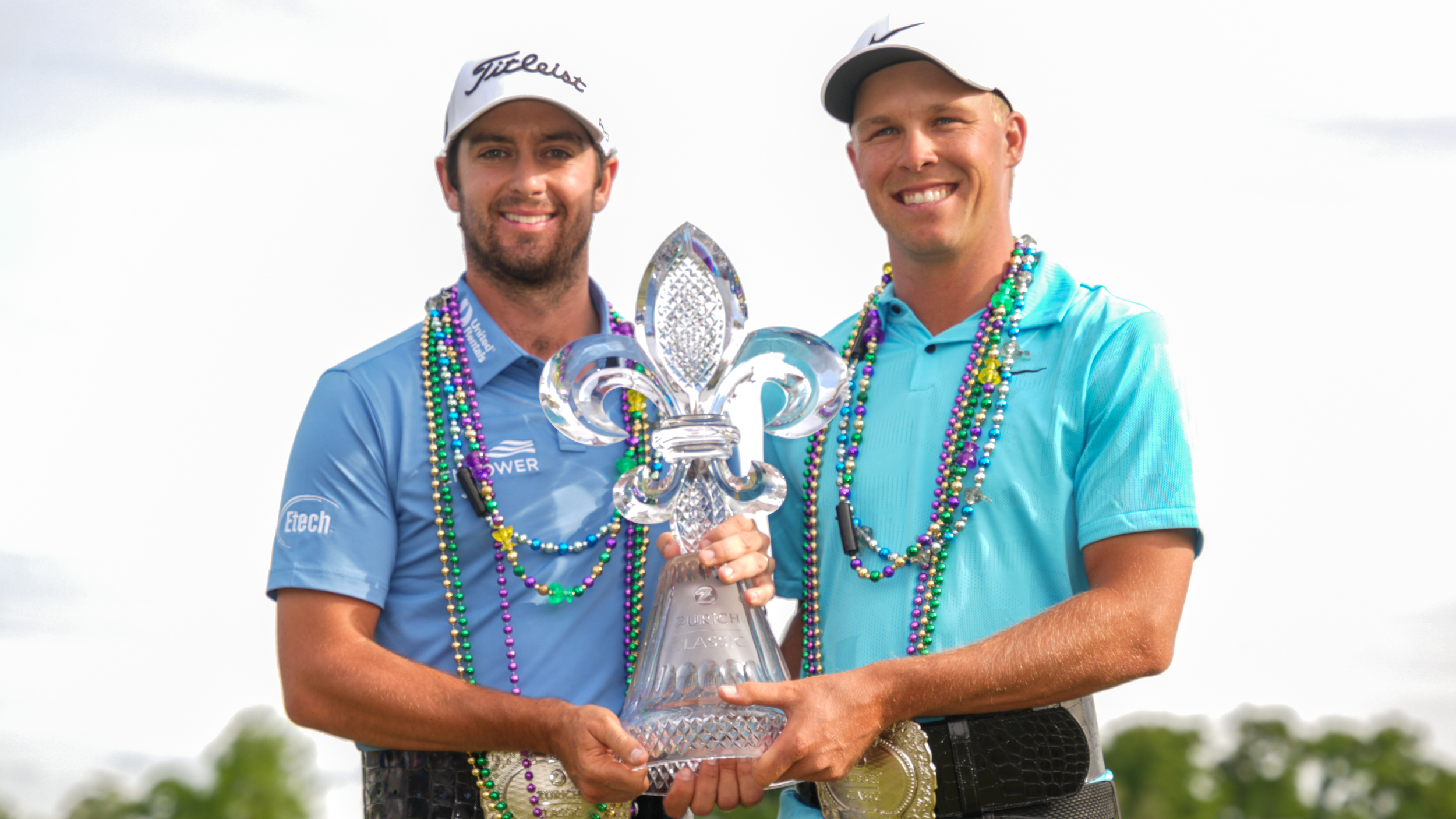 Davis Riley and Nick Hardy with the Zurich Classic of New Orleans trophy