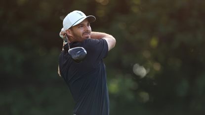 Aaron Wise hits a driver off the tee