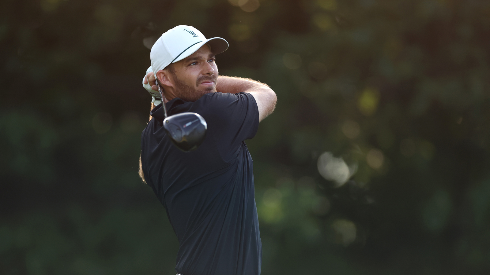 Aaron Wise hits a driver off the tee