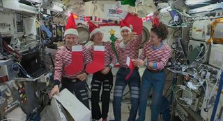 The Expedition 61 astronauts celebrate Christmas and the holidays in orbit aboard the International Space Station in December 2019.